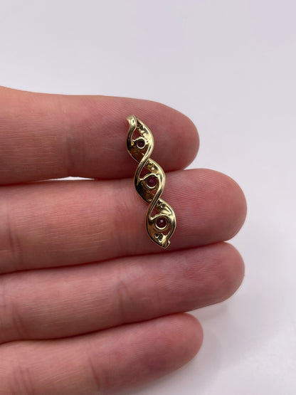9ct gold ruby and diamond pendant