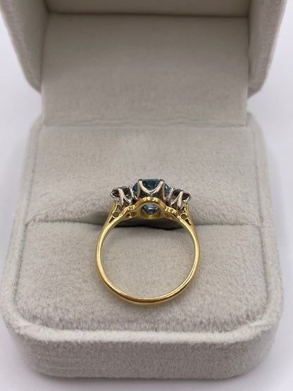 18ct gold blue zircon and diamond ring