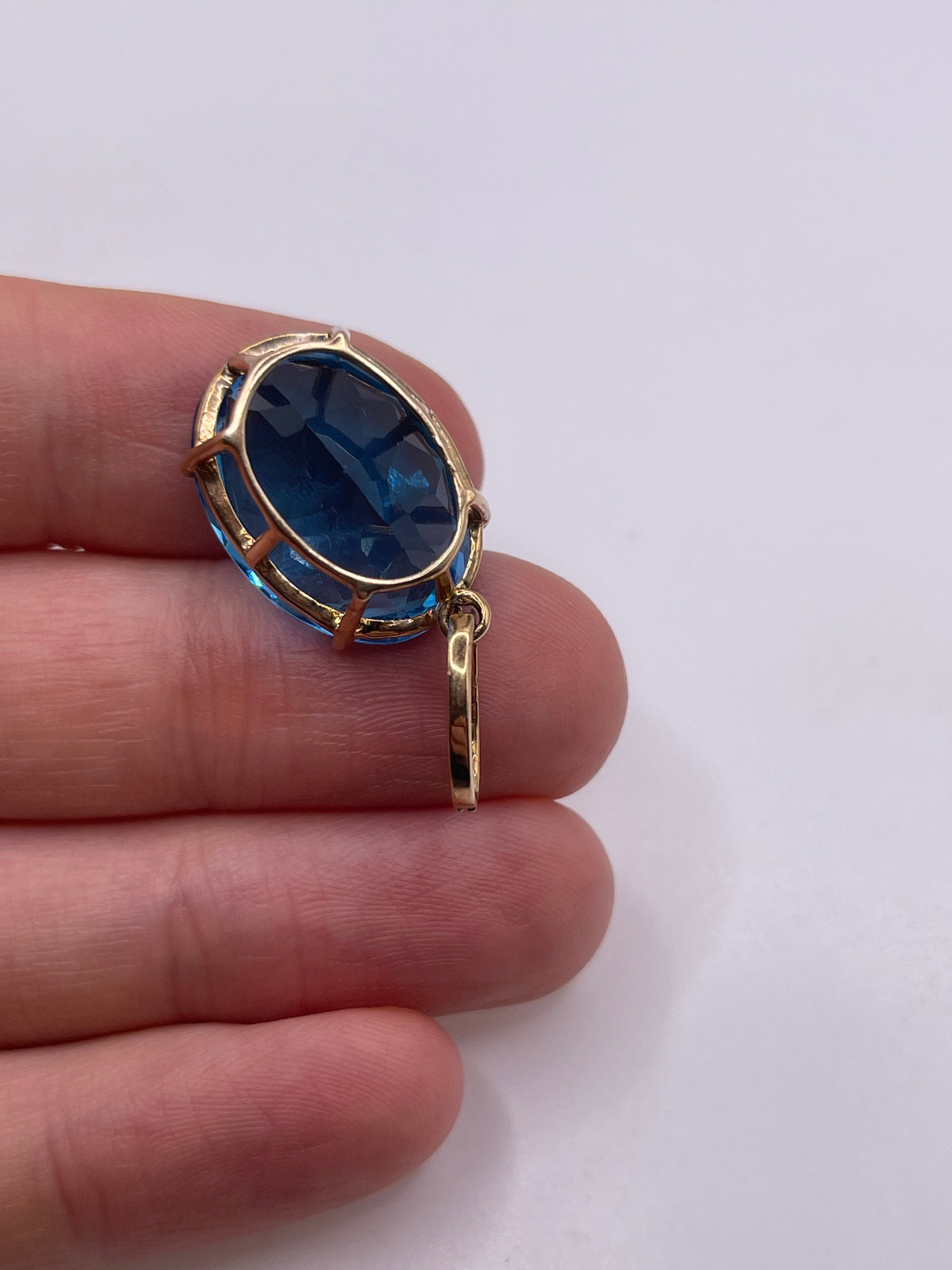 9ct gold blue topaz and diamond pendant