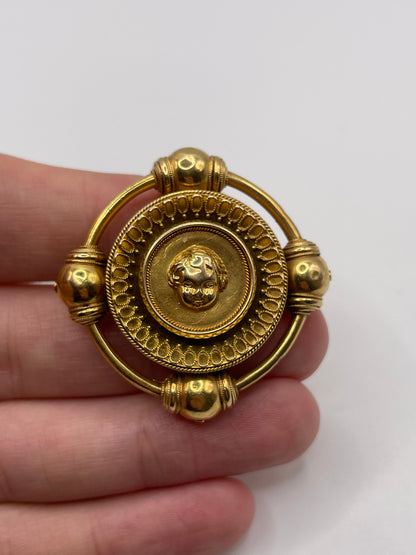 Antique 18ct gold cherub brooch