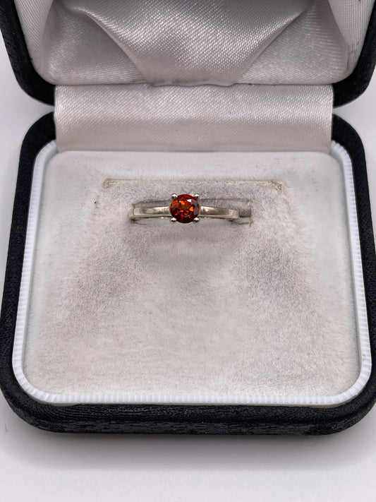 Silver topaz ring