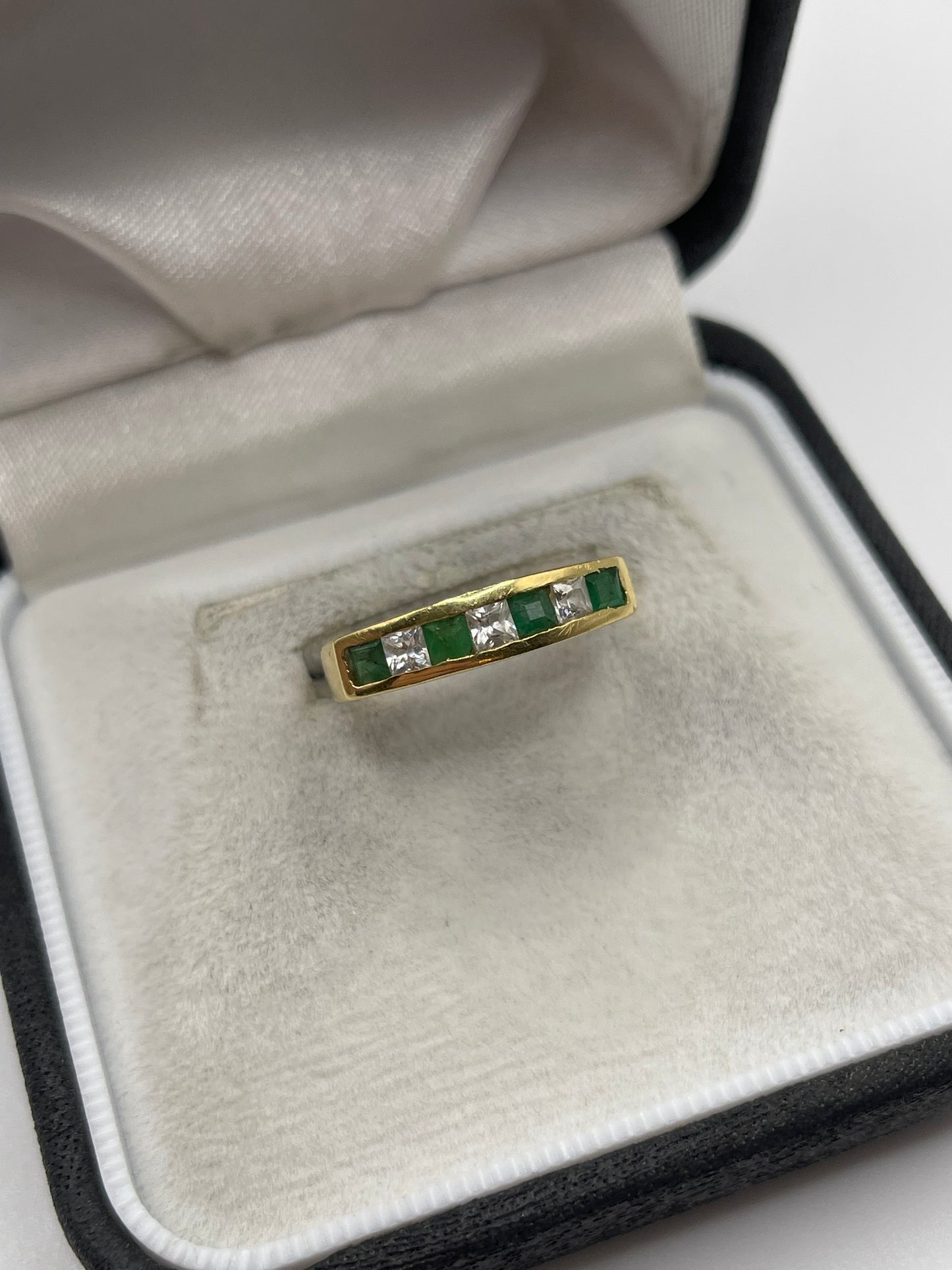 18ct gold emerald and cz ring