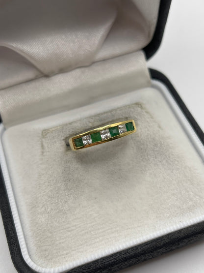 18ct gold emerald and cz ring