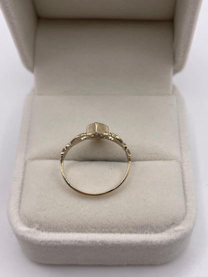 9ct gold topaz claddagh ring