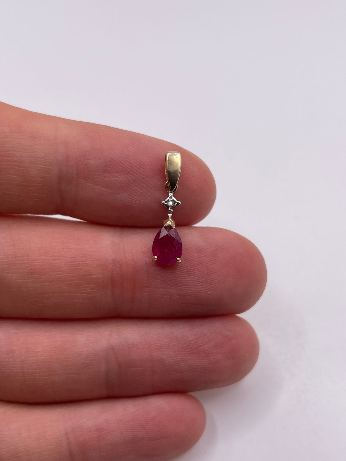 9ct gold ruby and diamond pendant