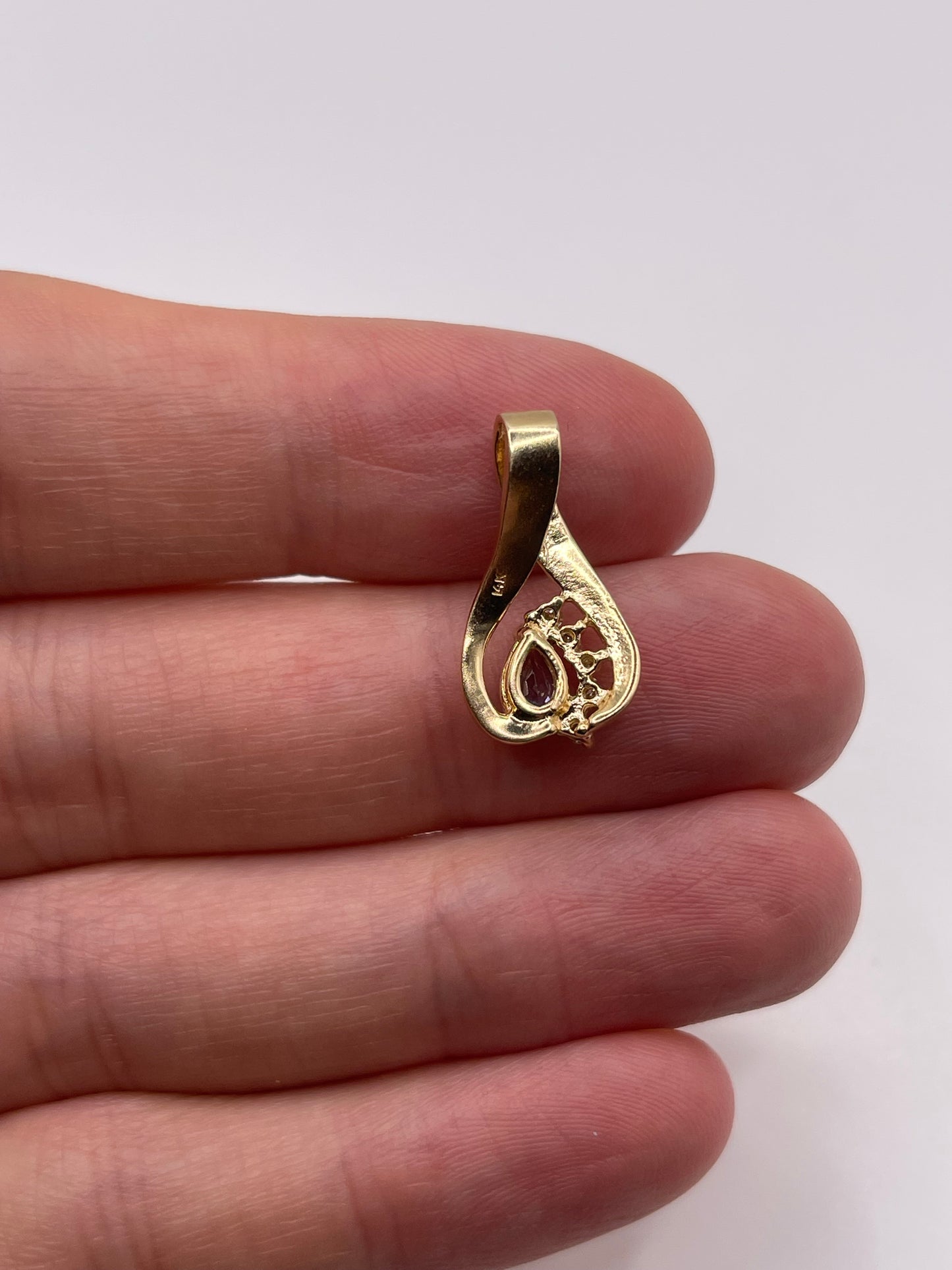 14ct gold tanzanite and diamond pendant
