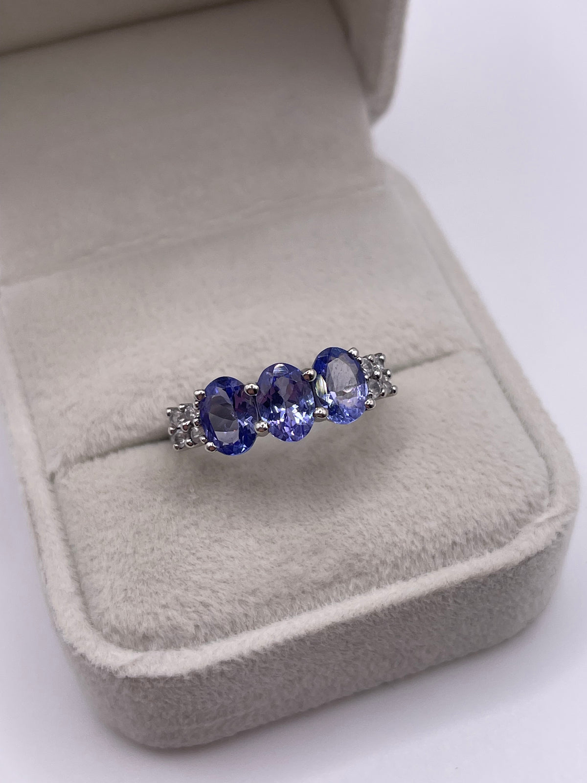 9ct white gold tanzanite and zircon ring