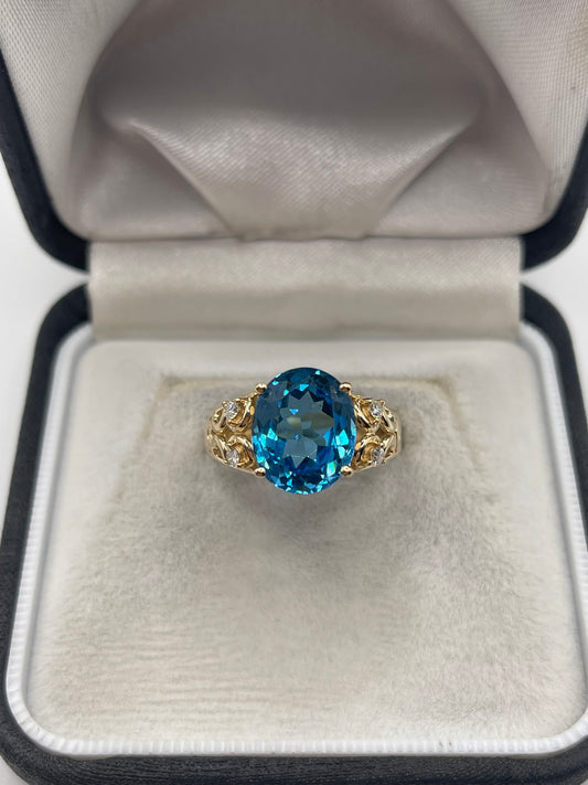 14ct gold blue topaz and diamond ring