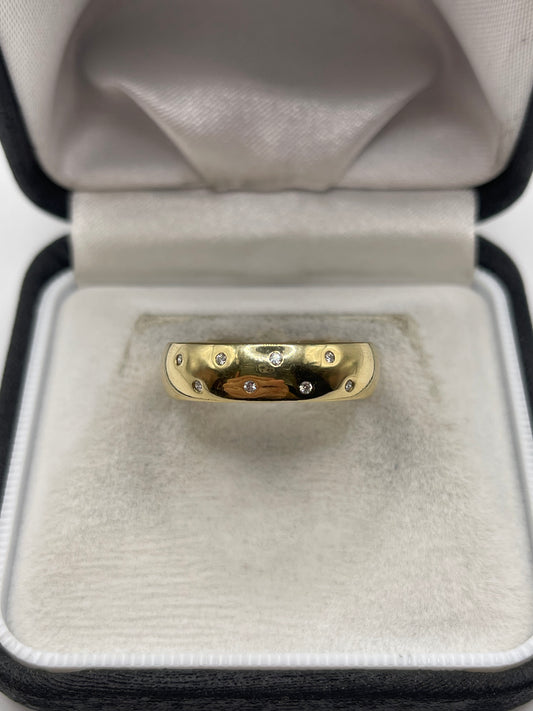 Heavy 18ct gold diamond band
