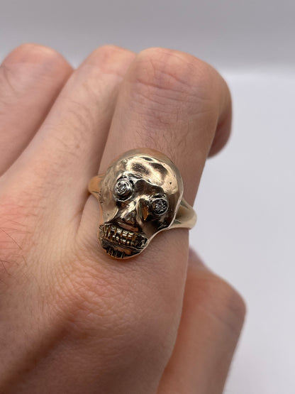 Heavy 9ct gold diamond skull ring
