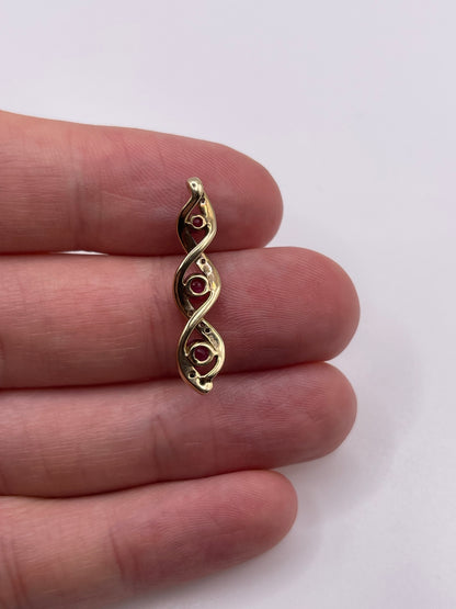 9ct gold ruby and diamond pendant