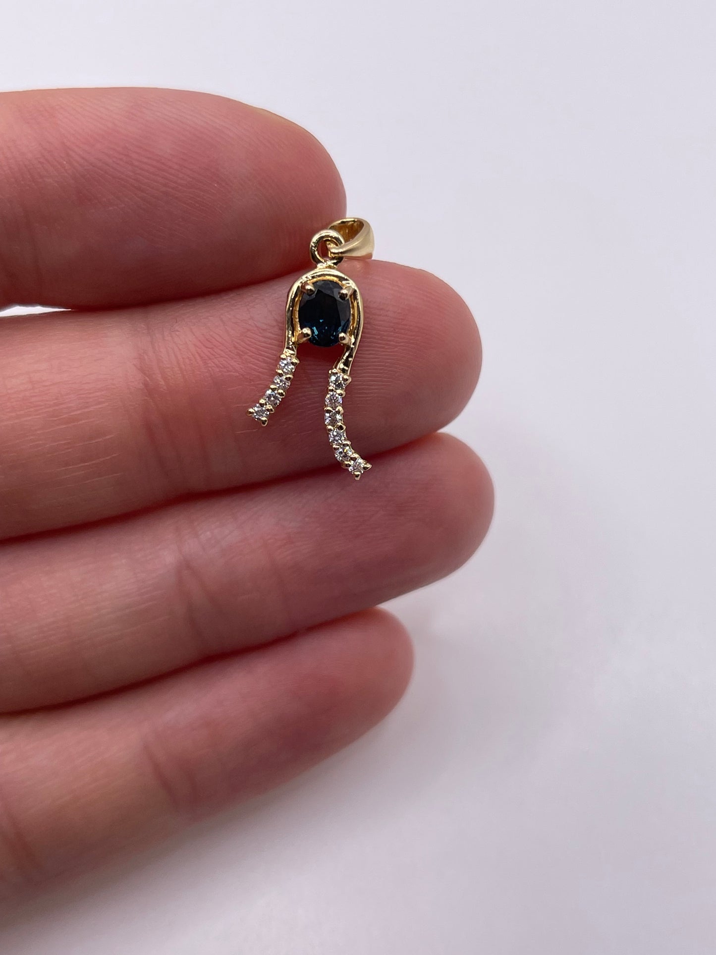 14ct gold sapphire and zircon pendant