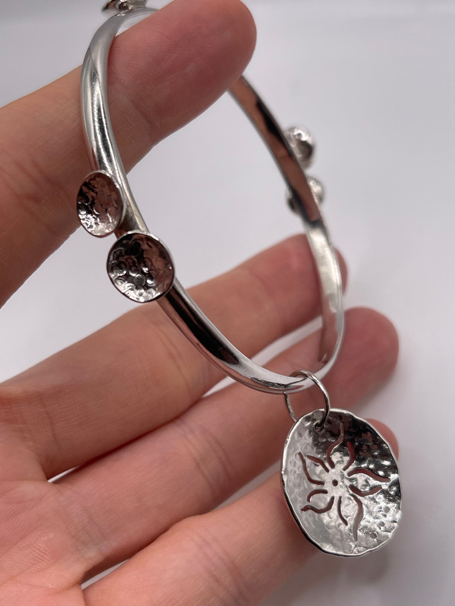 Silver hammered bangle