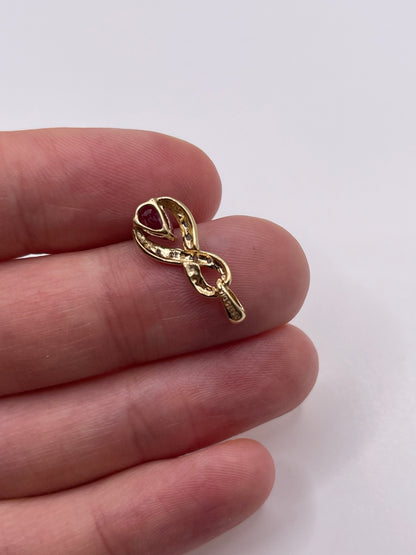 9ct gold ruby and diamond pendant
