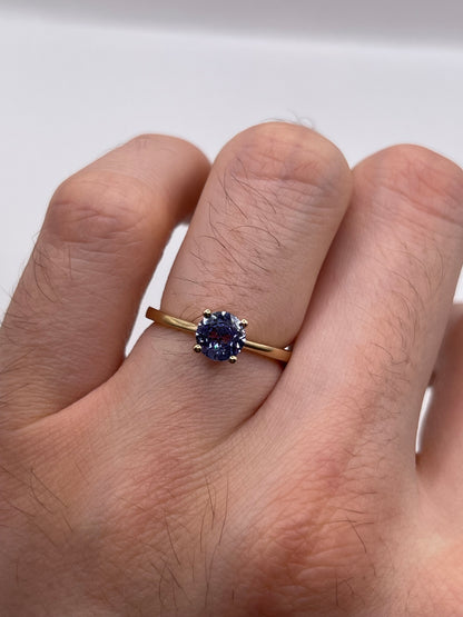 9ct gold tanzanite and emerald ring