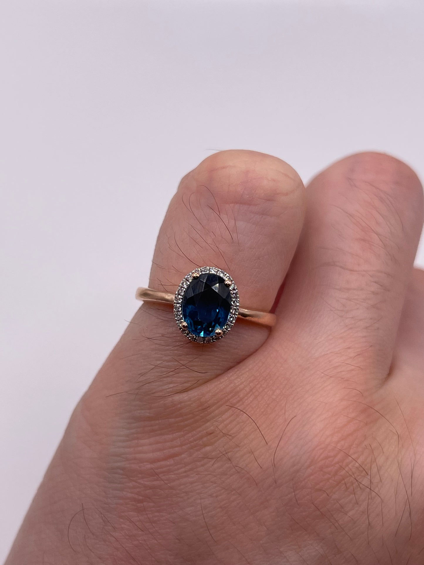 9ct rose gold blue topaz and diamond ring