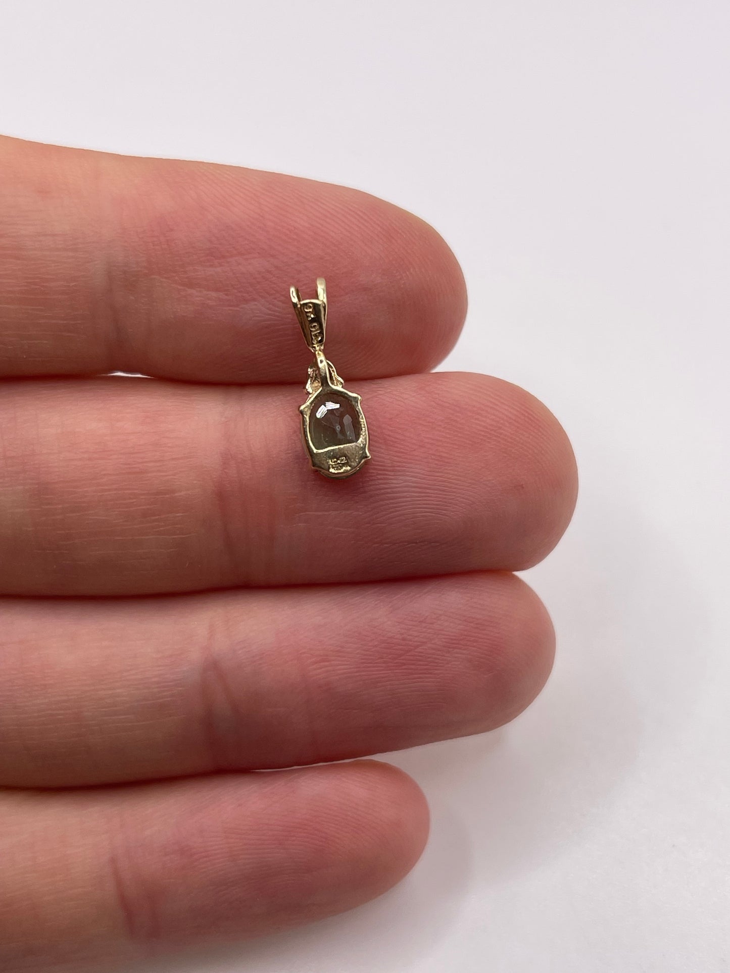 9ct gold emerald and diamond pendant