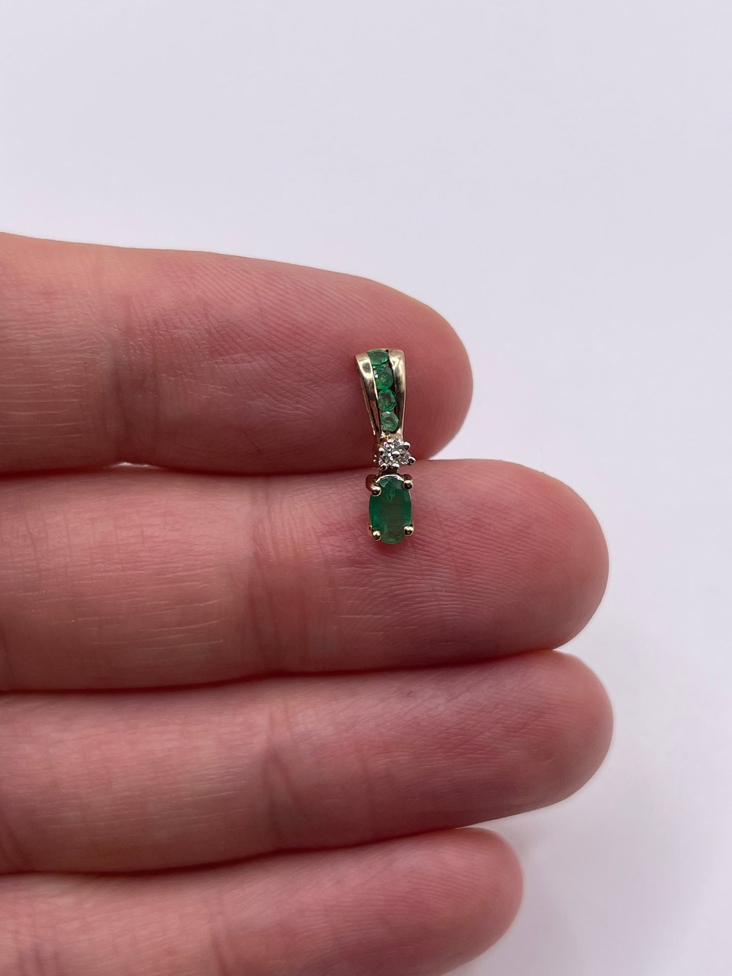 9ct gold emerald and diamond pendant