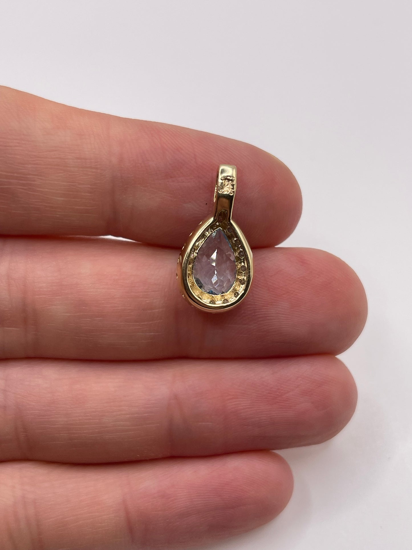 9ct gold topaz and diamond pendant