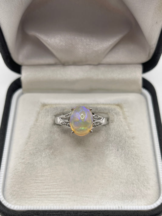 9ct white gold opal and diamond ring