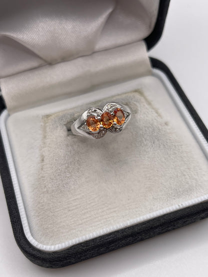 18ct white gold orange sapphire and diamond ring