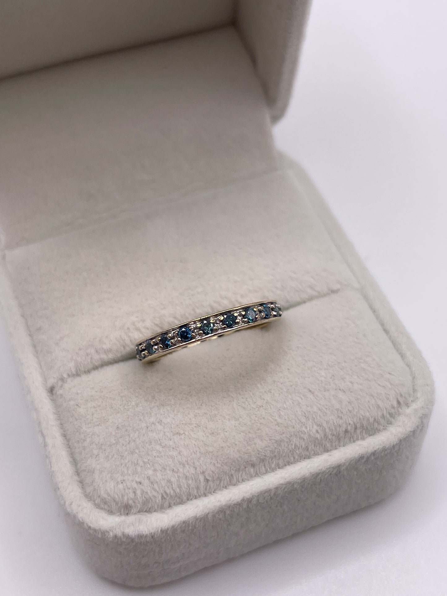 9ct gold blue diamond eternity ring