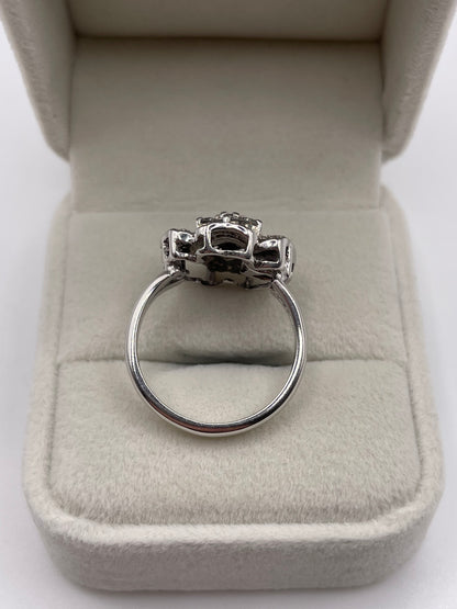 Heavy 18ct white gold diamond cluster ring