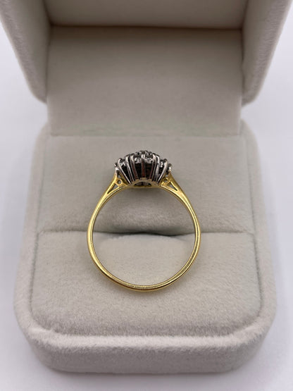 18ct gold emerald and diamond ring