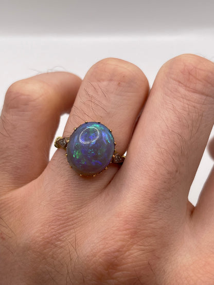18ct gold solid black opal and diamond ring