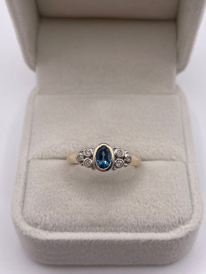 9ct gold blue topaz and diamond ring