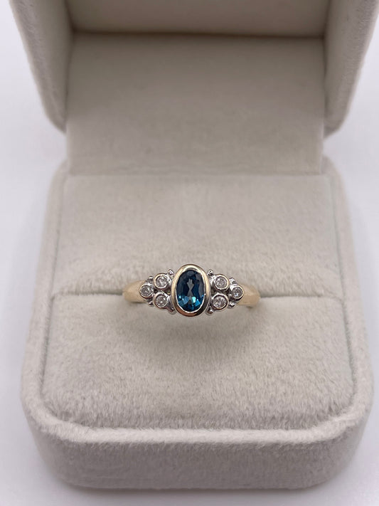 9ct gold blue topaz and diamond ring