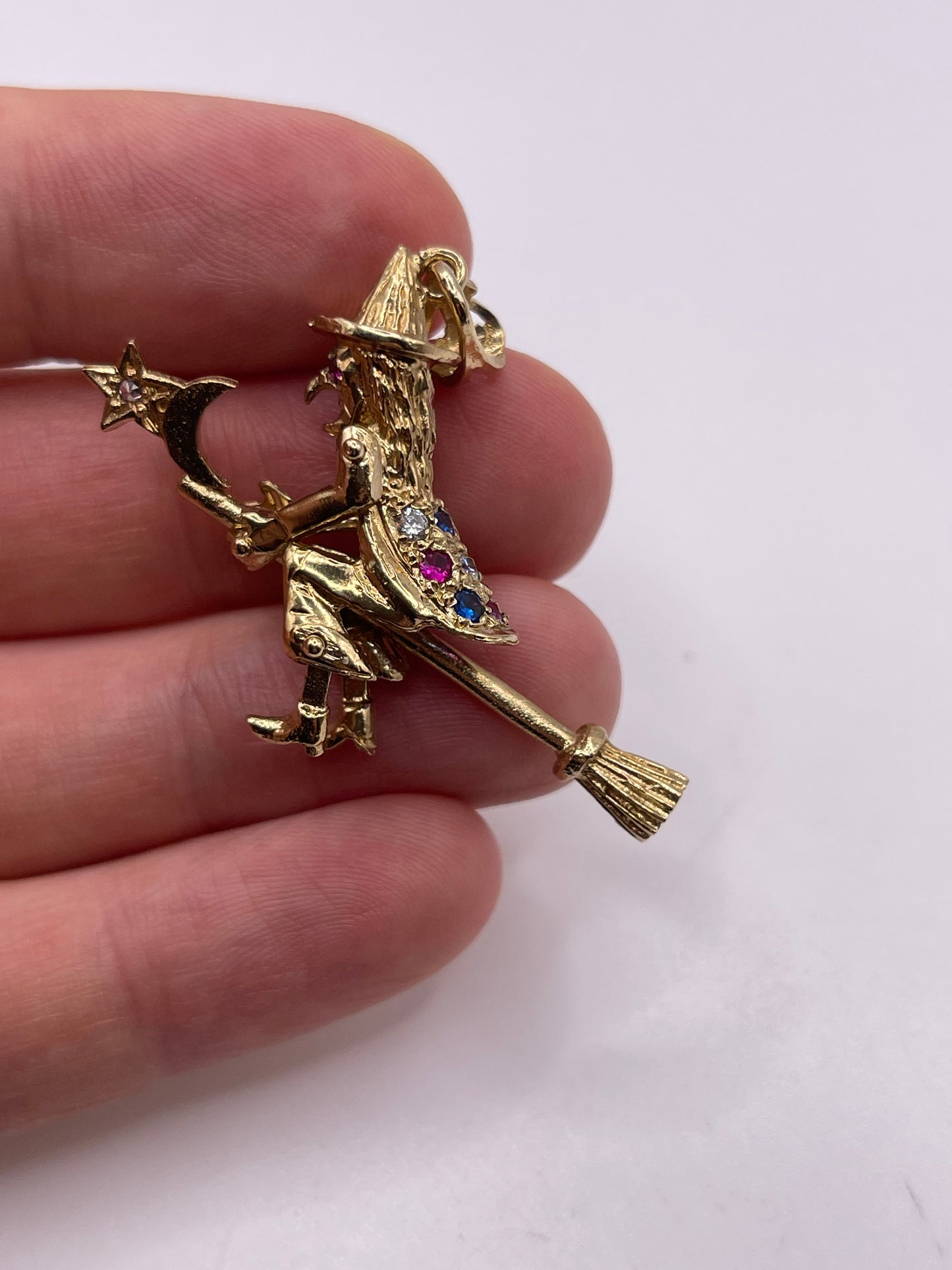 9ct gold articulated witch pendant