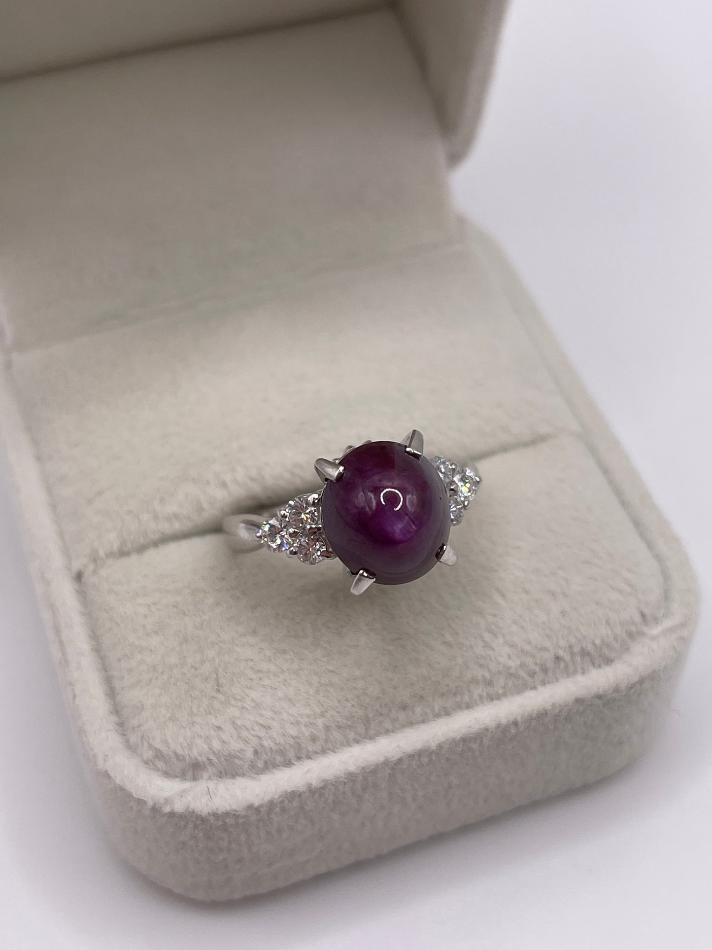 Platinum star ruby and diamond ring