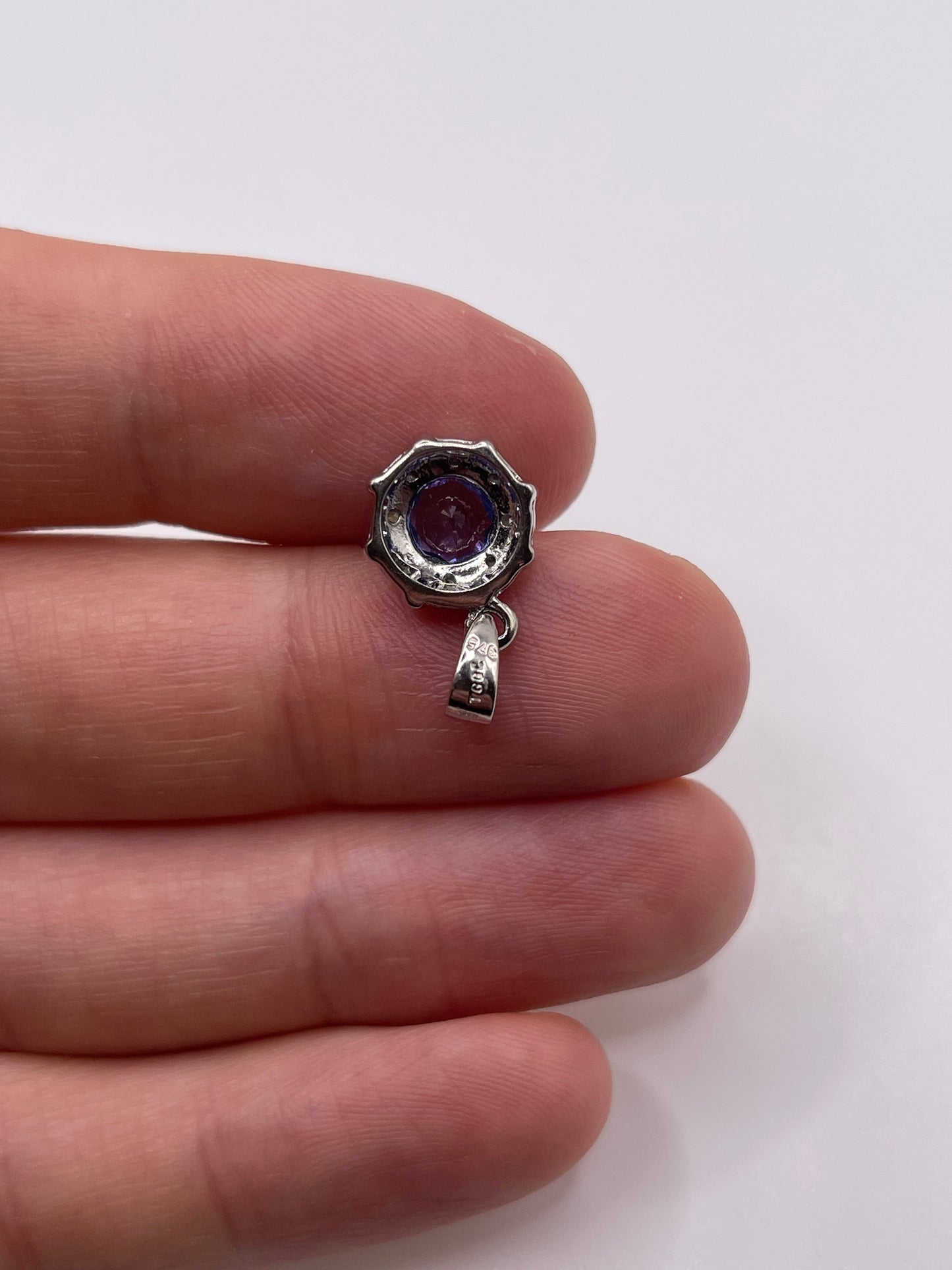 9ct white gold tanzanite and diamond pendant