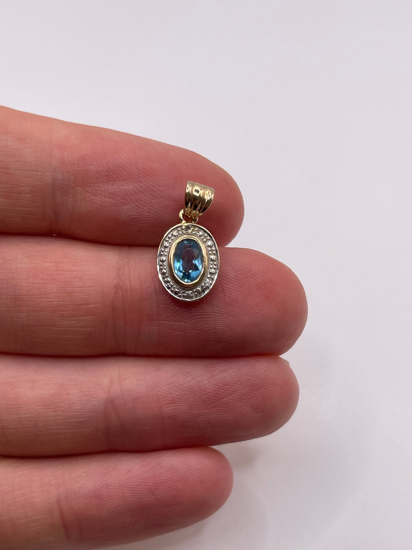 9ct gold topaz and diamond pendant