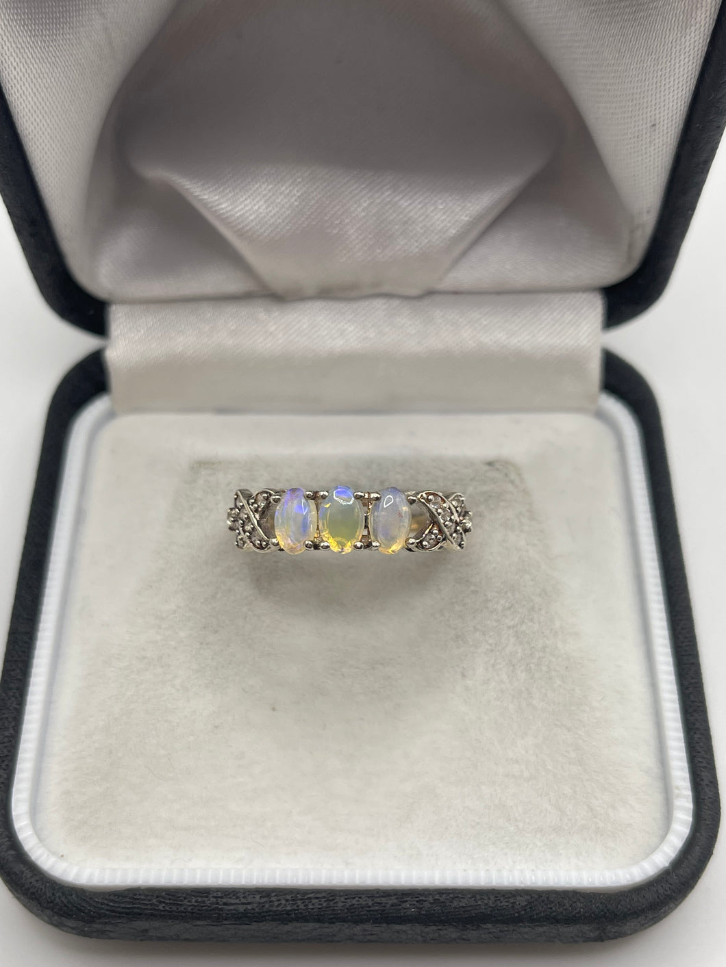 Silver opal and zircon ring