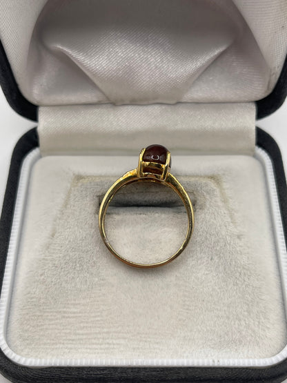 9ct gold cats eye and zircon ring
