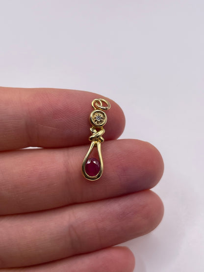 9ct gold ruby and diamond pendant