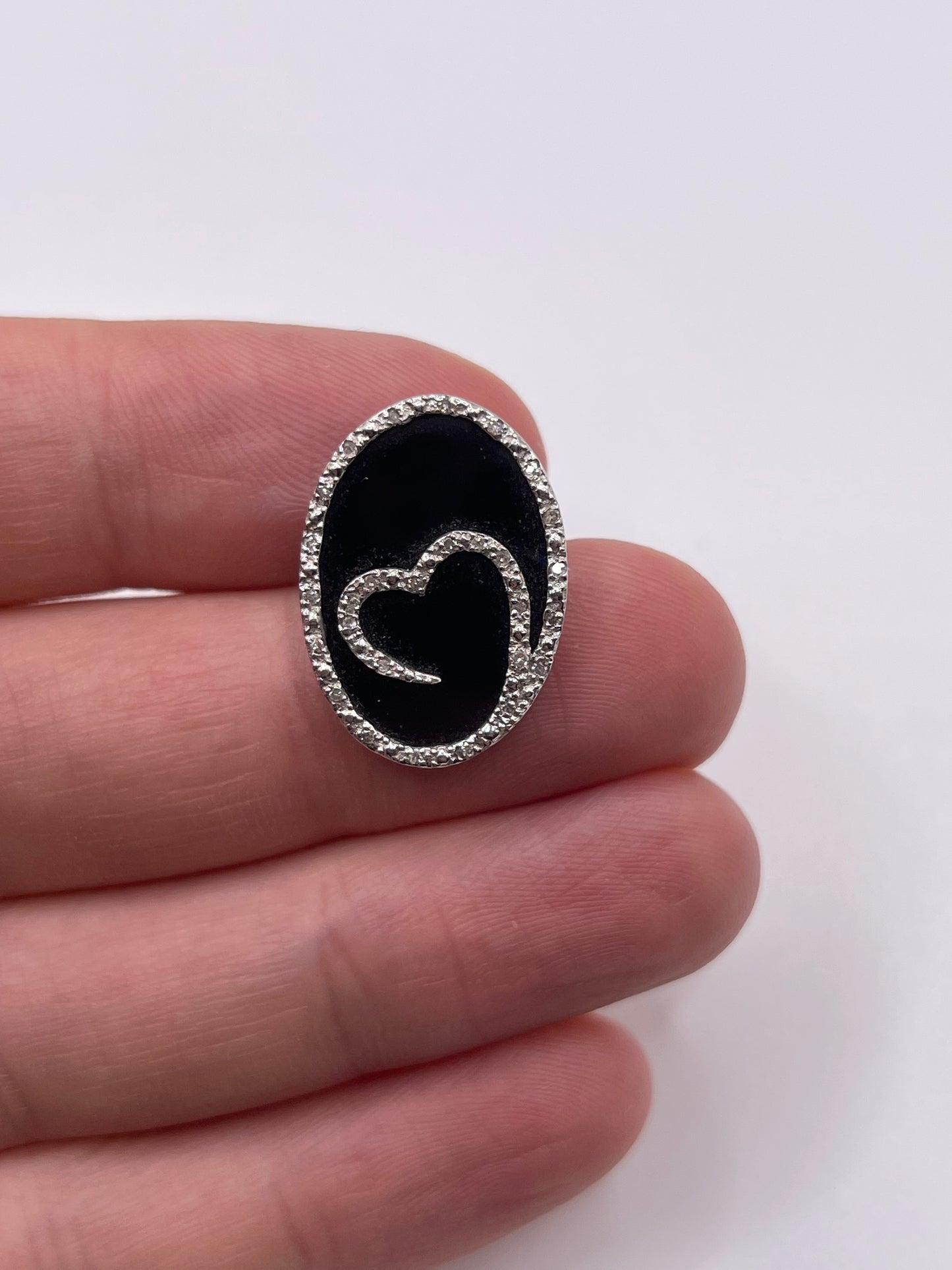 9ct white gold onyx and diamond pendant