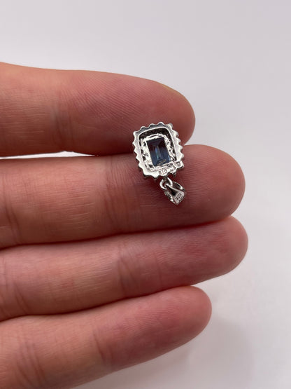 9ct white gold blue topaz and diamond pendant