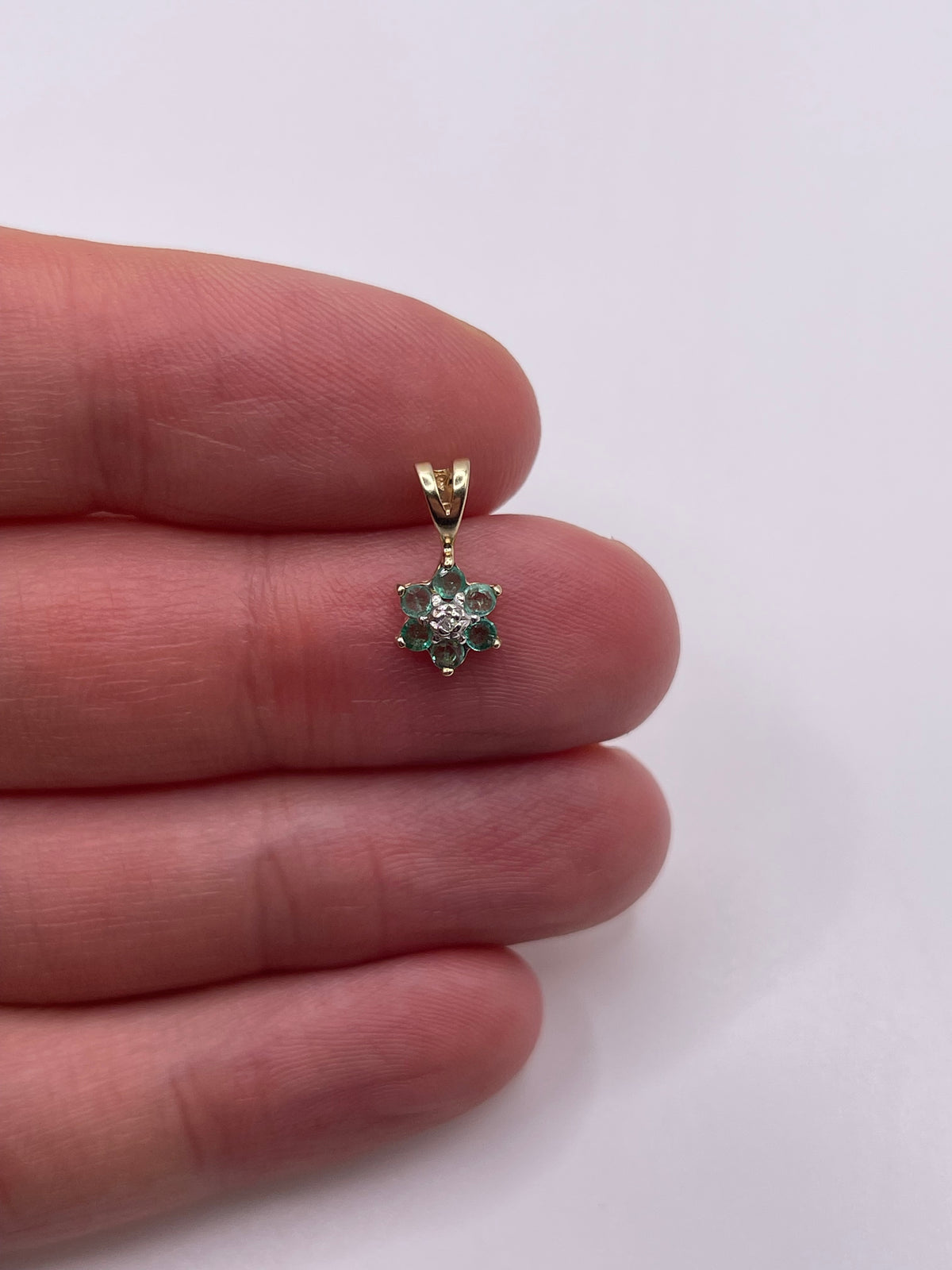 9ct gold emerald and diamond pendant
