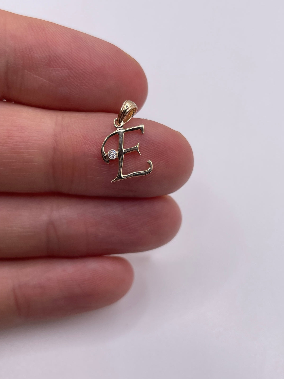 9ct gold diamond initial E pendant