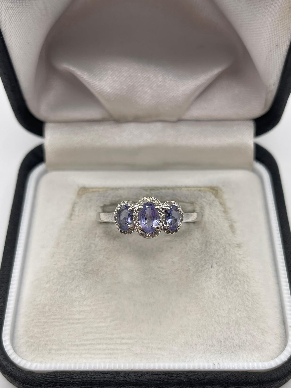 9ct white gold tanzanite and diamond ring