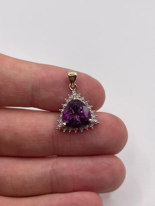 9ct gold topaz and diamond pendant