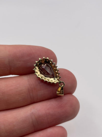 9ct gold topaz and diamond pendant