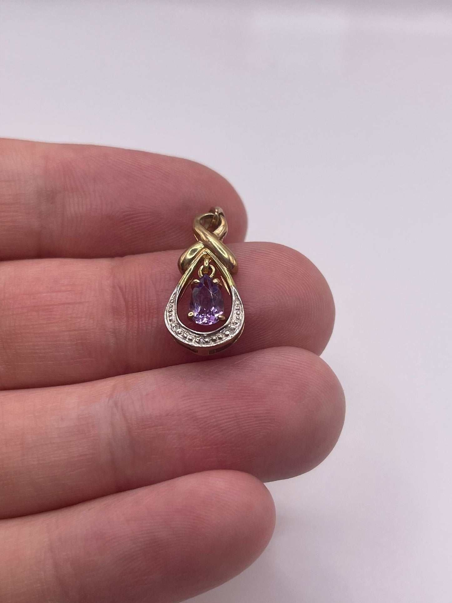 9ct gold amethyst and diamond pendant