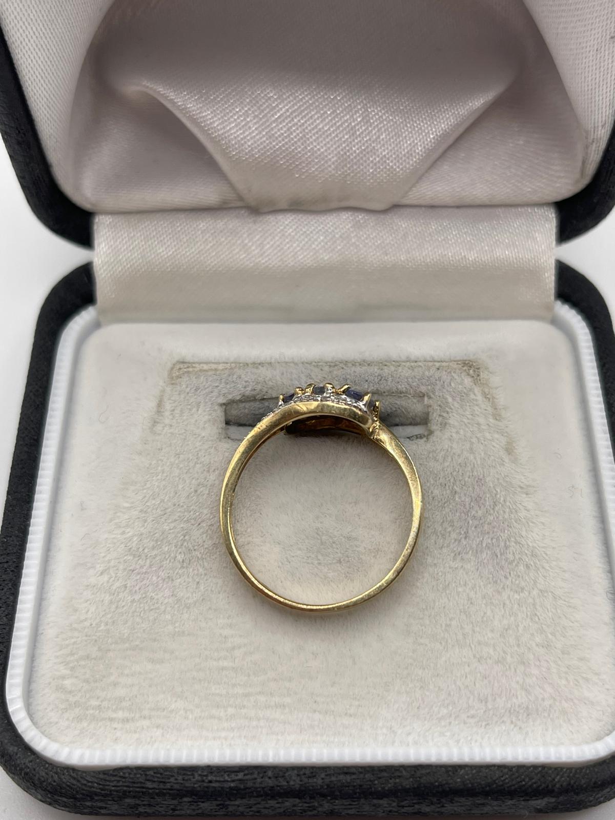 9ct gold tanzanite and diamond ring