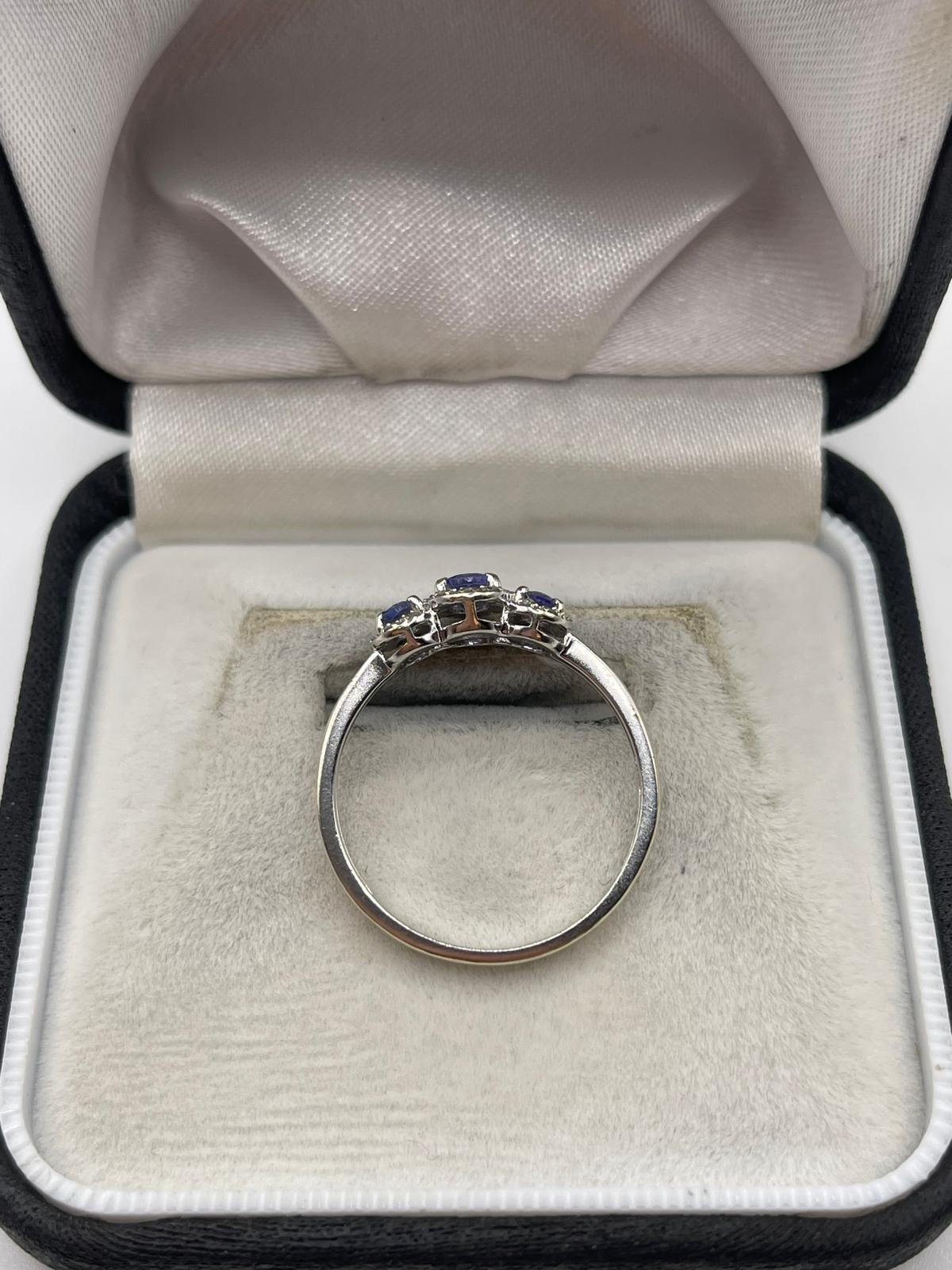 9ct white gold tanzanite and diamond ring