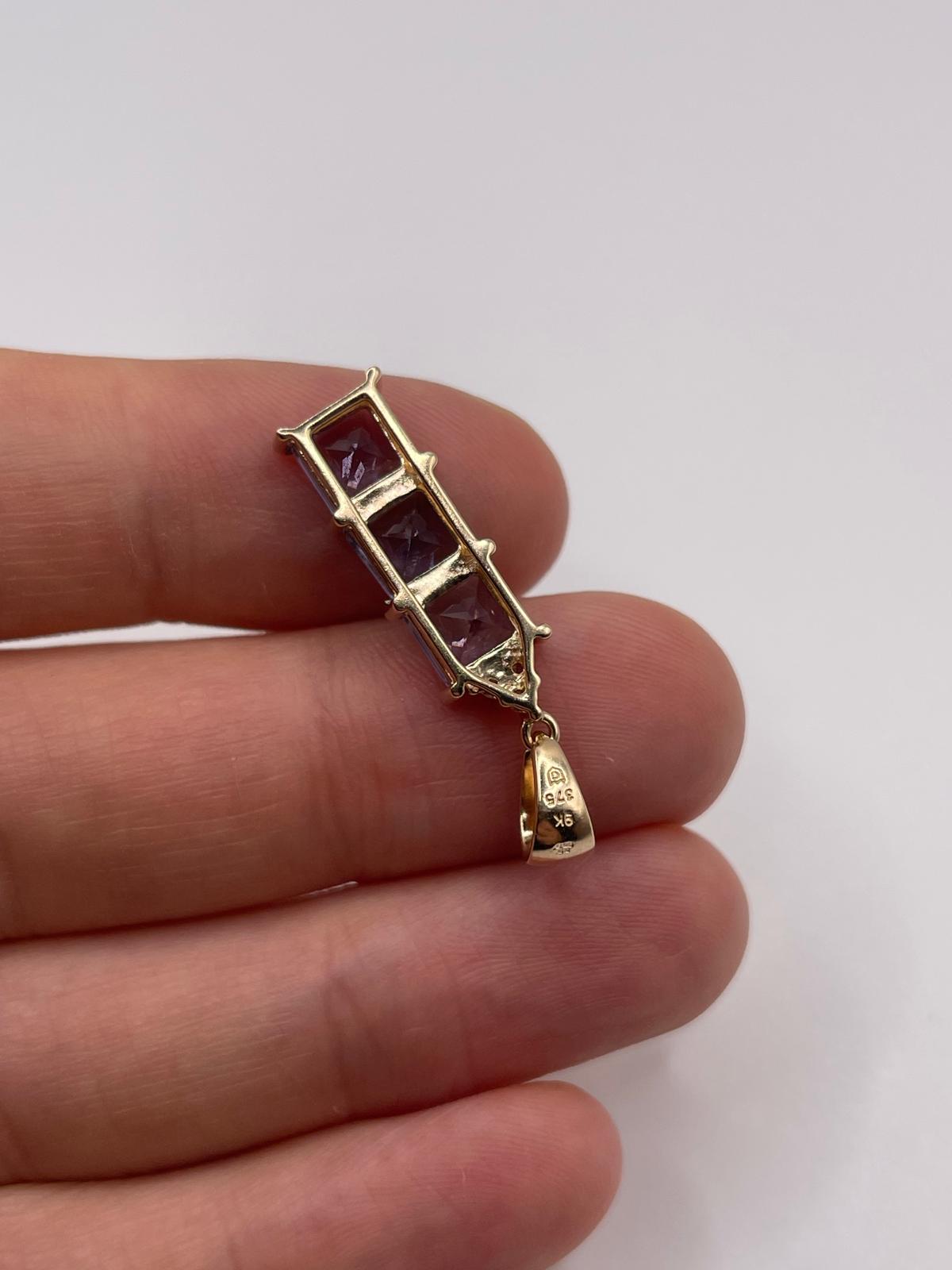 9ct gold iolite and zircon pendant
