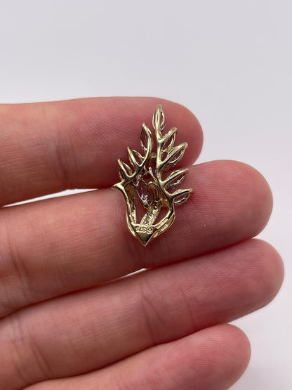 9ct gold tanzanite and diamond pendant
